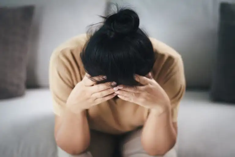 Exhausted tired depressed stressed thoughtful mature senior woman suffering from headaches, Brain diseases, mental problems, Alzheimer Concept.