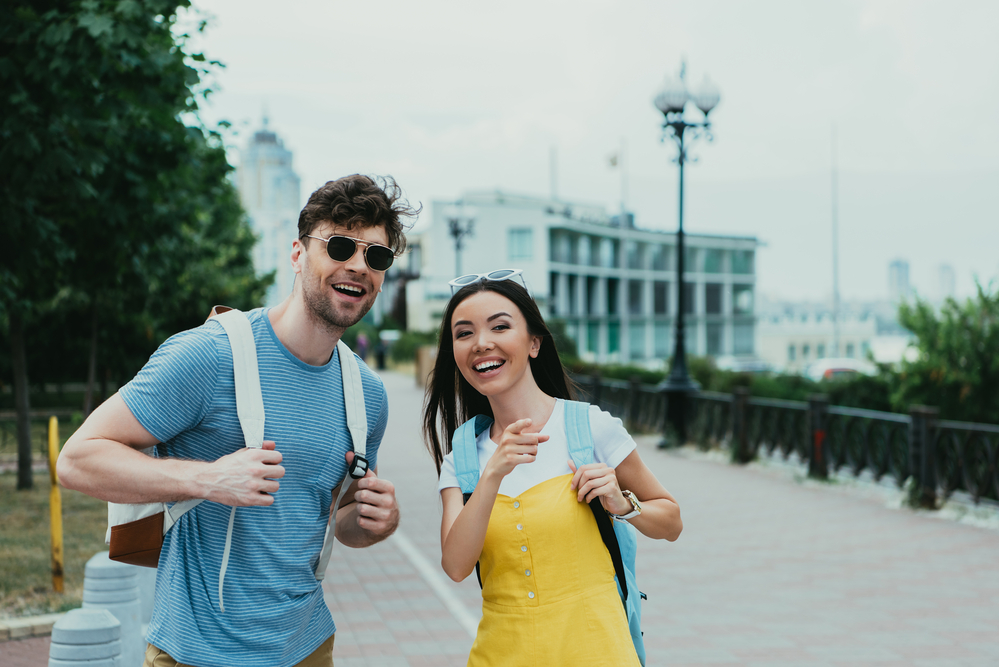 This image shows a couple happily travelling